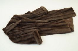 A grey 3/4 length mink coat, Silerian fur company Belfast