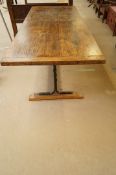 Large 20th century oak refectory table on an iron base