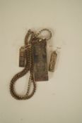 A silver ingot pendant, 1977, on a chain with a pair of silver ingot drop earrings, 47g gross