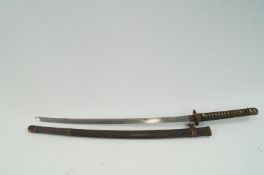 A WWII period Japanese sword, with shagreen grip solid along with a letter detailing history and