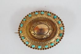 An 18ct gold turquoise mourning brooch