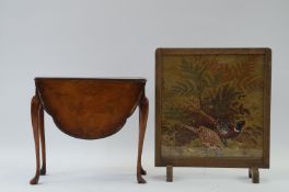 A small drop leaf table and a fire screen