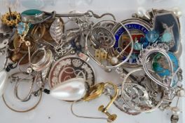 A box of silver and gold jewellery