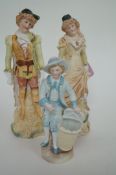 A pair of figures (Robin Hood and Maid Marion) and 1 other