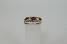 An 18ct ruby and diamond ring