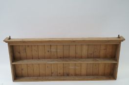 A large pine wall rack