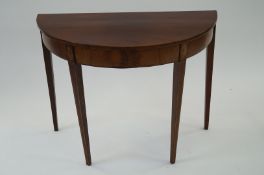 A mahogany demi loom table