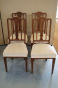 A set of oak dining chairs
