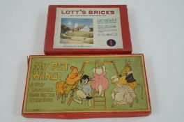 A set of Lott's bricks and a game of My Pet Wins