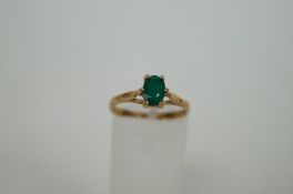 A 9 ct gold and green agate ring