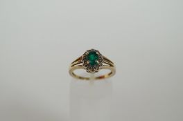 9ct green garnet and white stone ring