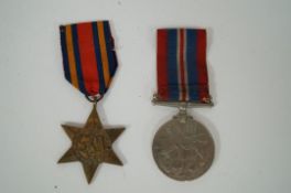 Two WWII medals, a Burma Start & Defence Medal, although unmarked the vendor states they were