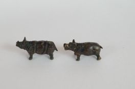 Two bronze miniature figures of hippos