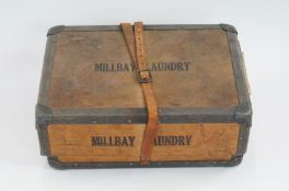 A Millbay laundry box and book