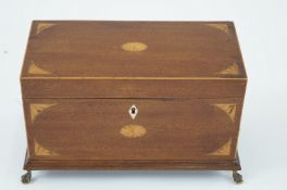 A mahogany tea caddy, inlaid with yew marquetry