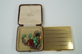 A box of mixed jewellery plus a "Comoys of London" cigarette case