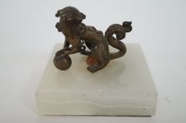 Chinese Dog of Fo finial on a marble base