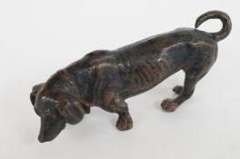 A cold painted bronze of a dachshund, stamped "Geschutzt"