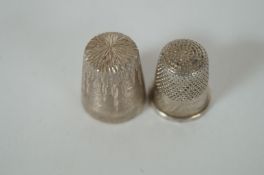 A silver Charles Horner thimble and one other silver thimble
