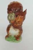 A Beatrix Potter squirrel nutkin with gold lettering, 1950's