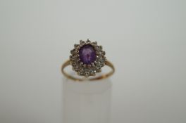 9ct amethyst and white stone ring