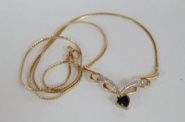 A 9ct gold gold topaz and diamond necklace