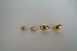 A pair of 9ct dolphin earrings and a pair of 9ct coffee bean shape earrings