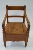 A commode chair oak
