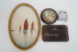 A Japanese cigarette case, lighter, compact and a w/c of sailing boats