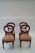 A set of Victorian mahogany button back chairs