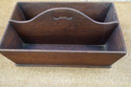 A wooden cutlery tray