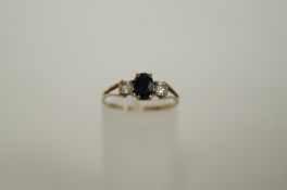 9ct sapphire and white stone ring