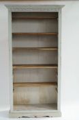 A white painted bookcase