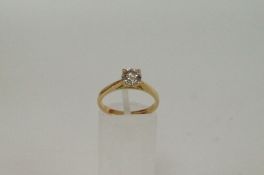 An 18ct gold and diamond engagement ring, approx 70 points