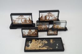 A collection of oriental cork models