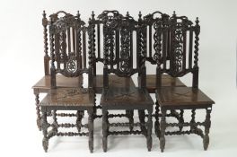 An Victorian oak dining table with six chairs