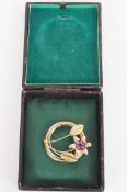 A 14ct and 18ct gold yellow and rose amethyst brooch