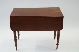A Victorian mahogany drop flap table