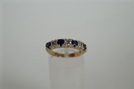 9ct seven stone diamond and sapphire ring