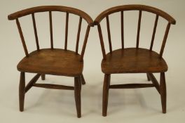 A pair of oak child's chair