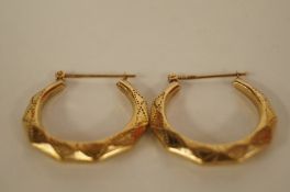 A pair of 9ct creol earrings