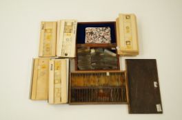 Three boxes of microscope specimen slides