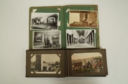 Two postcard albums, approximately 50 mixed black and white and coloured together with some post war