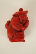 An oriental carved snuff bottle of a fisherman