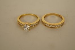 A cubic zirconia set gilded ring, stamped "925" with another
