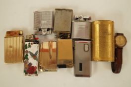 A collection of items including Ronson lighters etc.