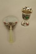 An oriental magnifying glass with a jade handle, along with an oriental wine cup
