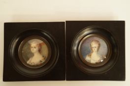 A pair of early 20th century portrait miniatures, signed Nattier