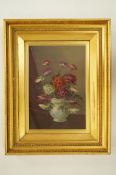 A 20th century still life of flowers signed "A. Reemish"