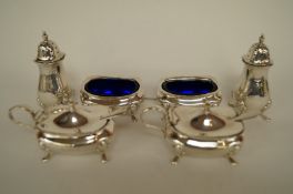 A matched six piece silver cruet set, Mappin & Webb, Birmingham 1925 - 26, comprising two peppers,